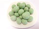 Le wasabi de forme ronde a enduit la couleur verte de casse-croûte d'arachide coûtée les arachides croustillantes