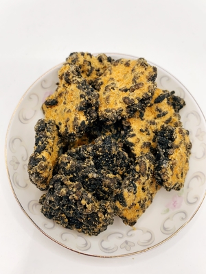 Guoba d'or noir Jaune d'œuf salé et filet de porc saveur riz biscuit mélange riz croustillant croûte de riz frit