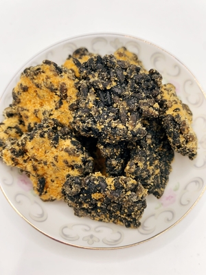 Guoba d'or noir Jaune d'œuf salé et filet de porc saveur riz biscuit mélange riz croustillant croûte de riz frit