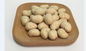 Casse-croûte enduits rôtis sains de noix de cajou de sésame de farine de blé avec le goût croustillant et croquant