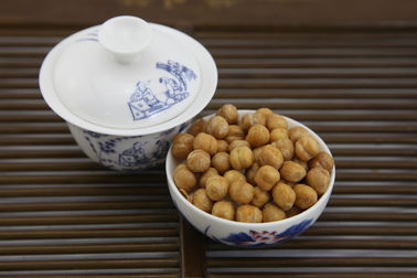 Le wasabi à faible teneur en matière grasse a rôti le casse-croûte de pois chiches, texture dure cuite au four croquante de pois chiches