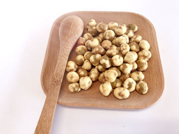 Les pois casse-croûte, taille de saveur de BBQ tamisée ont séché des vitamines de pois d'ail contenues